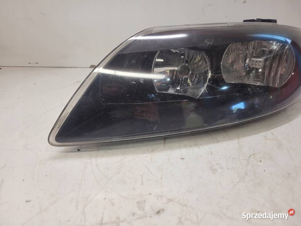 REFLEKTOR LEWY ZWYKŁY AUDI Q7 4L 4L0941003K UK Przystajń