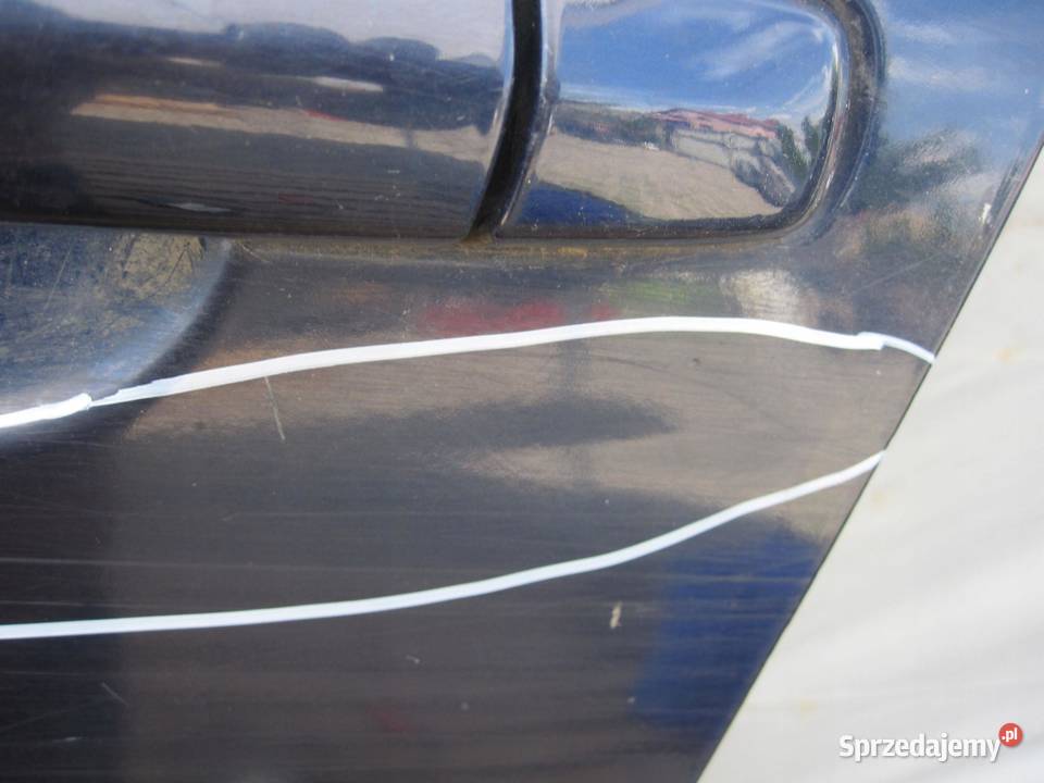 SUZUKI GRAND VITARA II LIFT 09r drzwi lewe przód sprzedam