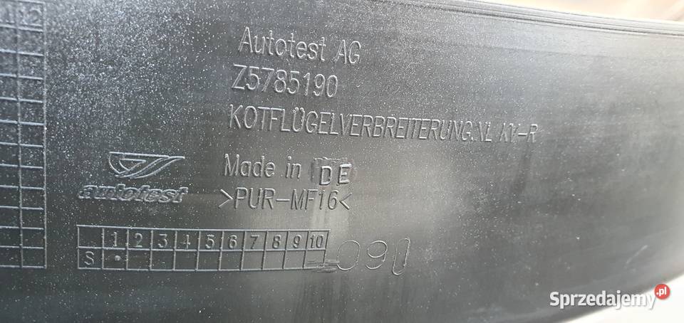 MITSUBISHI L200 LISTWA BŁOTNIKA LEWY TYŁ Trzciel