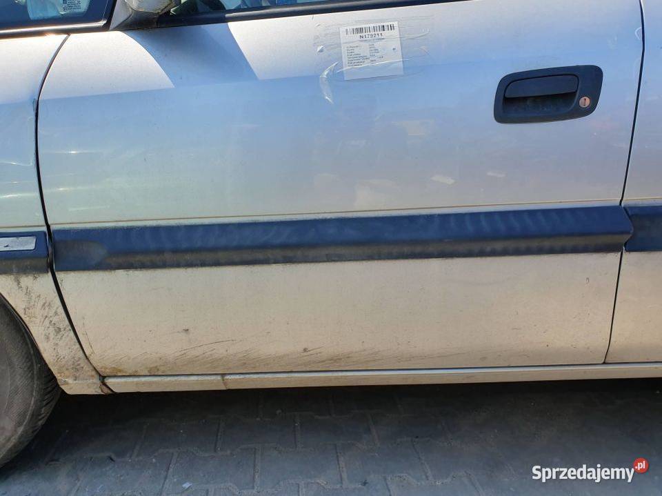 DRZWI LEWE PRZÓD OPEL ZAFIRA 2AU osobowe Lipno