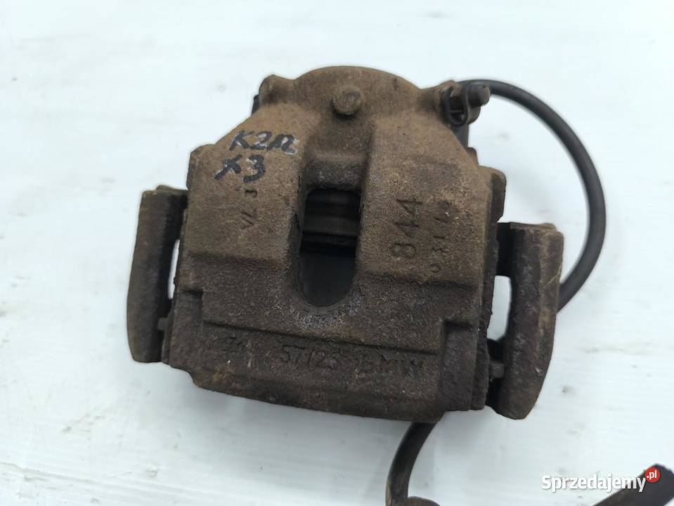ZACISK PRAWY PRZÓD BMW X3 E83 wielkopolskie