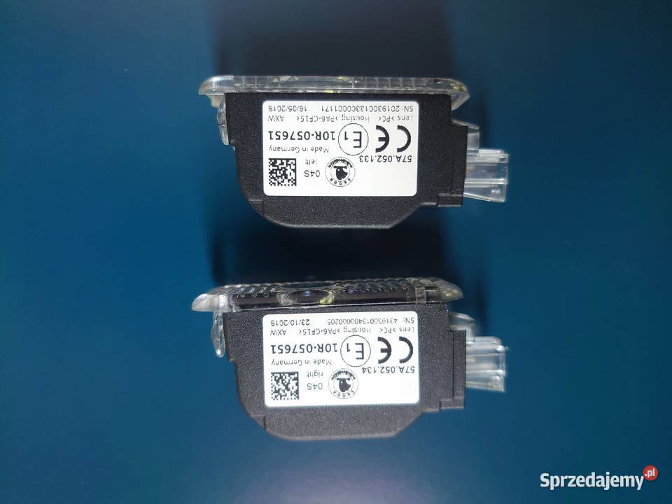 Projektor logo lampka Skoda oryg 57A052133 lewa Częstochowa