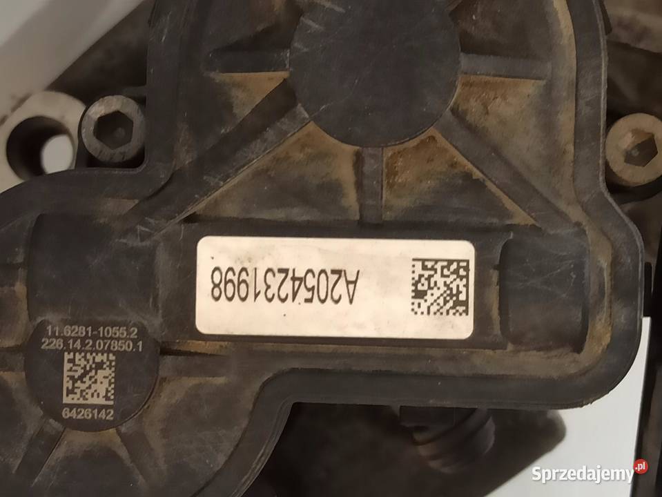 MERCEDES W205 ZACISK LEWY TYŁ A2054231998 osobowe Zaciski i jarzma