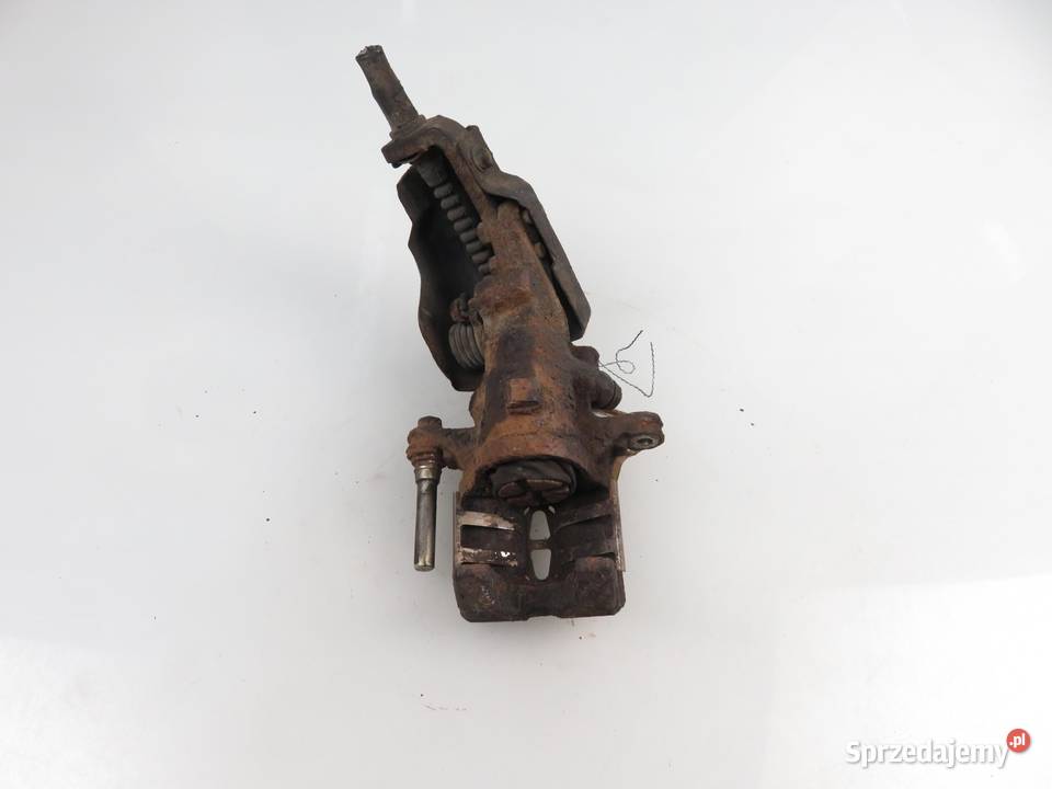 ZACISK PRAWY TYŁ ROVER 600 623 Si H 23 A3