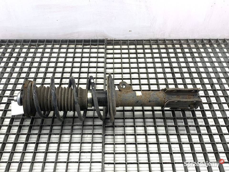 AMORTYZATOR PRAWY PRZÓD ZE SPRĘŻYNĄ TOYOTA YARIS Amortyzatory