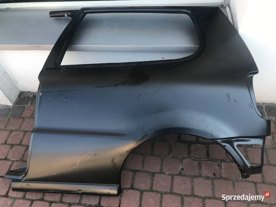 BŁOTNIK TYL POLO LEWY 942000 3DRZWI Gidle