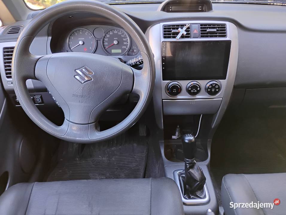 Suzuki Liana 16 Gaz Hak Grzane fotele Radio nieuszkodzony Gdów