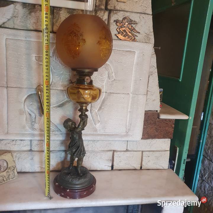 Sprawna figuralna lampa naftowa z amorkiem na Wrocław