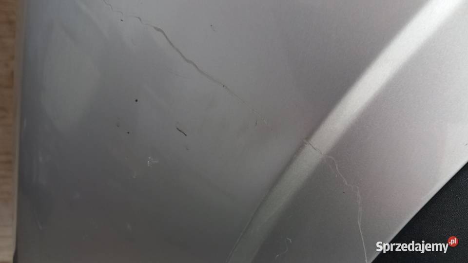OPEL ANTARA BŁOTNIK PRZÓD PRAWY 92U Zbierkowo