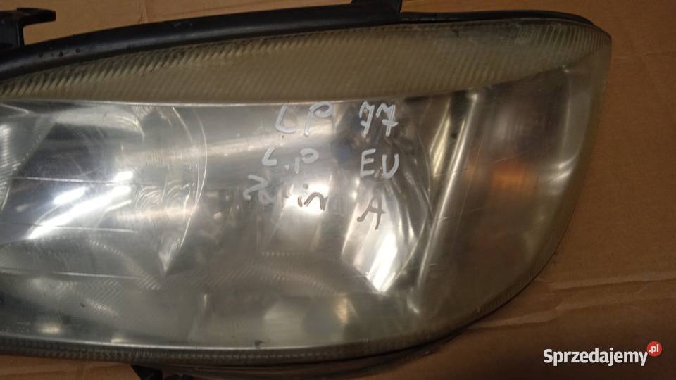 OPEL ZAFIRA A LAMPA PRZÓD LEWA EU Zbierkowo