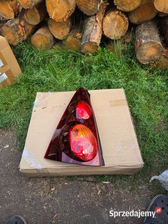 Lampa lewa lewy tył tylna Peugeot 107 1607990580
