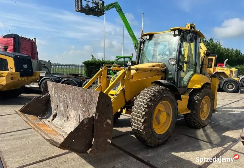 Koparko ladowarka kolowa Komatsu WB 97S tez Warszawa