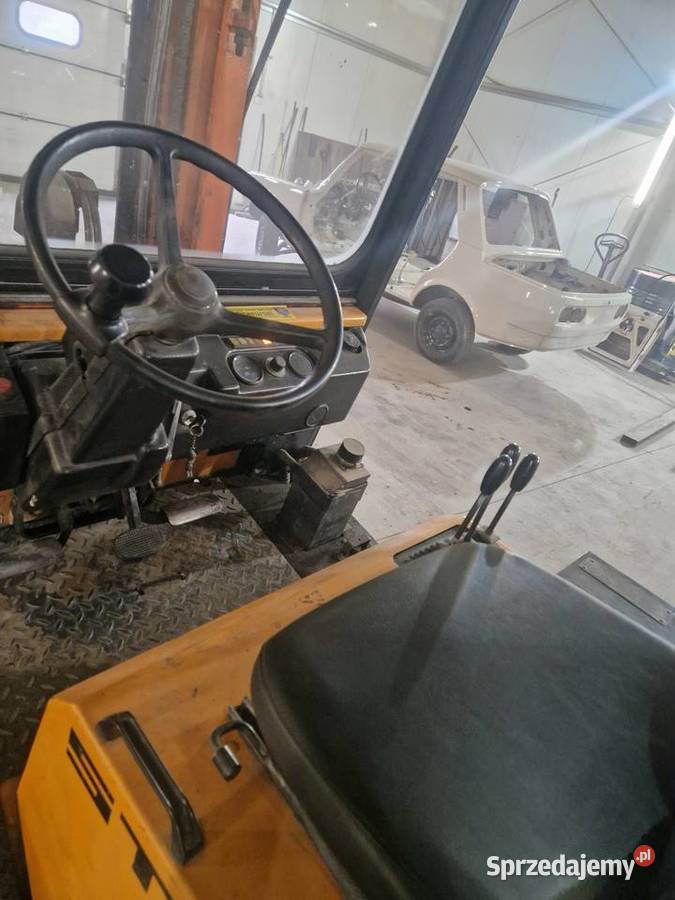 Wózek widłowy Still przesuw boczny 2T