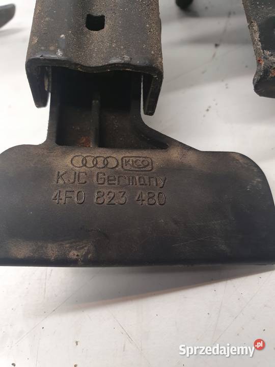 ZAMEK MASKI RYGIEL AUDI A6 C6 4F0823480