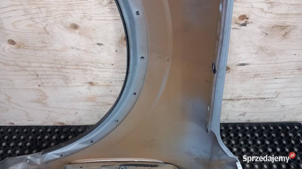 OPEL ANTARA BŁOTNIK PRZÓD PRAWY 92U Zbierkowo sprzedam