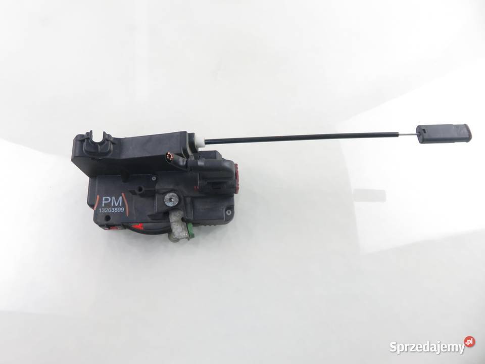 ZAMEK LEWY PRZEDNI OPEL CORSA C X01 13203899PM Motoryzacja