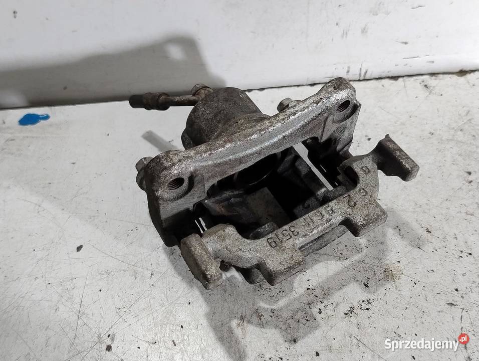 ZACISK HAMULCOWY LEWY TYŁ INFINITI EX 30 D