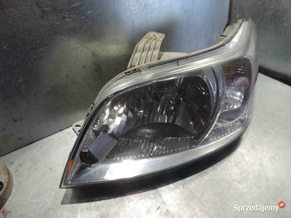 CHEVROLET AVEO FL REFLEKTOR LEWY PRZEDNI LAMPA