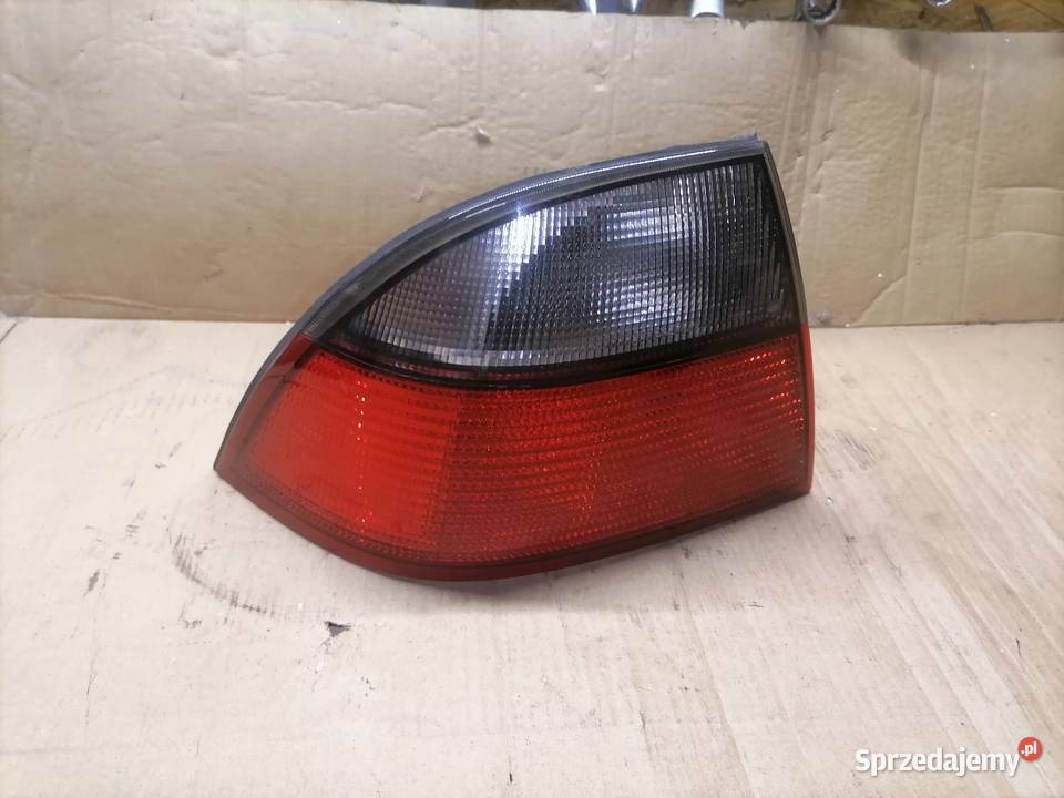 Saab 9 5 95 lampa tył tylna lewa Lampy tylne Mostki