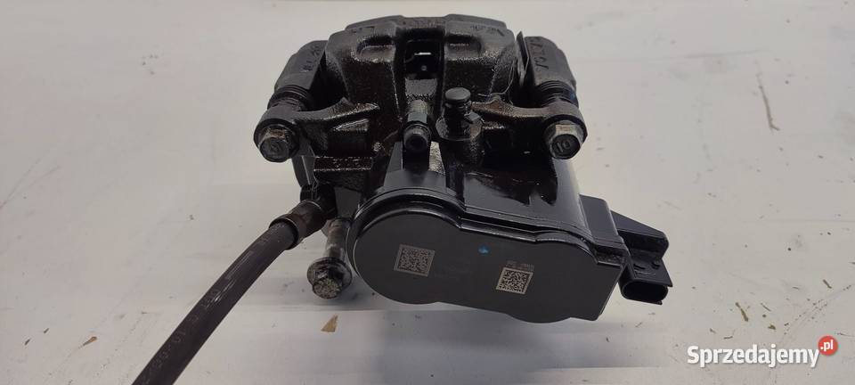 VOLVO XC40 ZACISK HAMULCOWY LEWY TYŁ 32276921