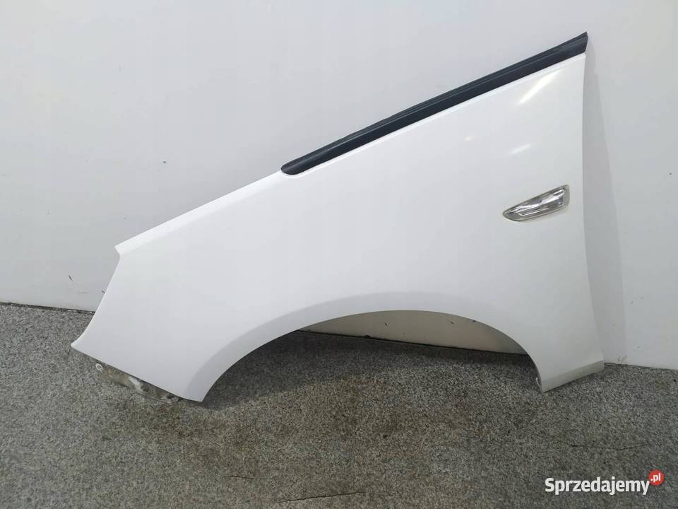 BŁOTNIK LEWY PRZÓD BIAŁY Opel Zafira III 2011 osobowe