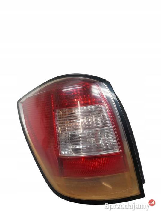 LAMPA TYŁ LEWA KOMBI LIFT FL 13223675 Opel Astra