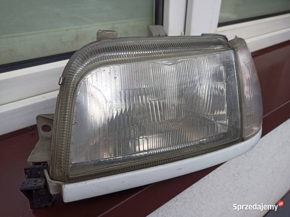 Renault Clio I 1 lampa przednia lewe reflektor Sieradz