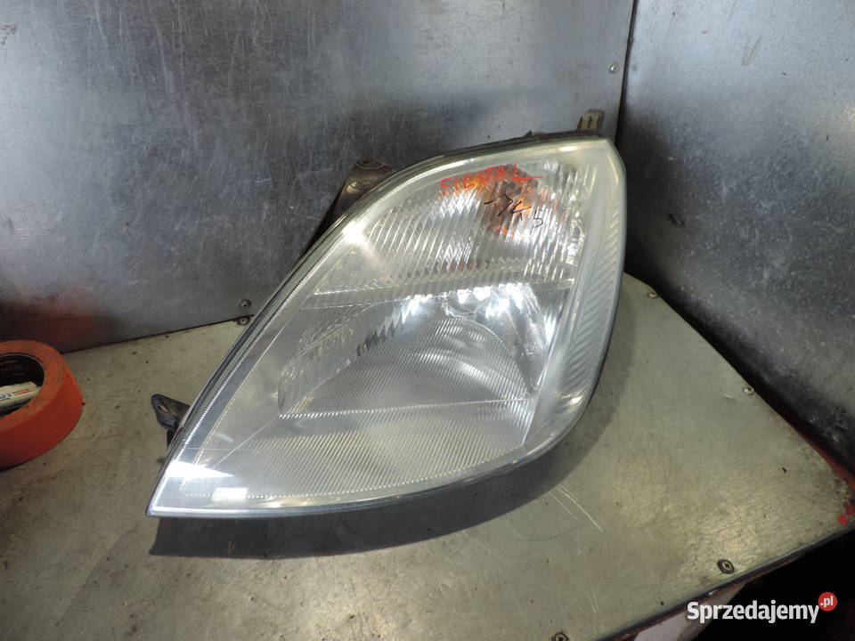 FORD FIESTA MK5 REFLEKTOR LAMPA LEWY PRZÓD osobowe Nowy Sącz