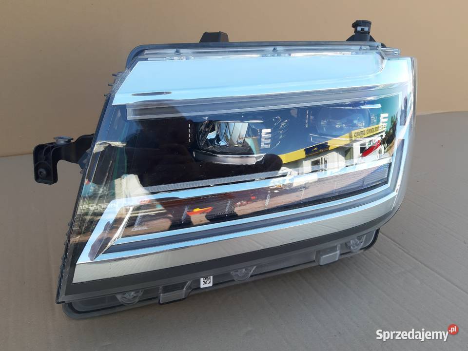 VW CRAFTER II MAN TGE REFLEKTOR LEWY LAMPA FULL Trzciel