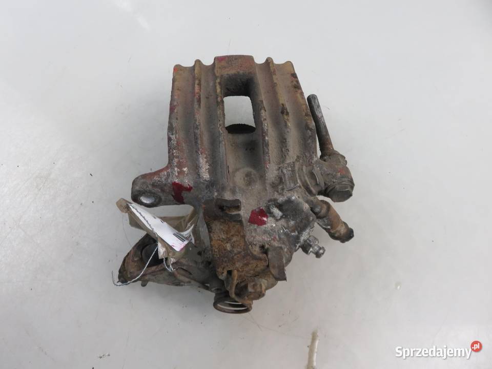 ZACISK LEWY TYŁ SEAT TOLEDO II 19 TDI