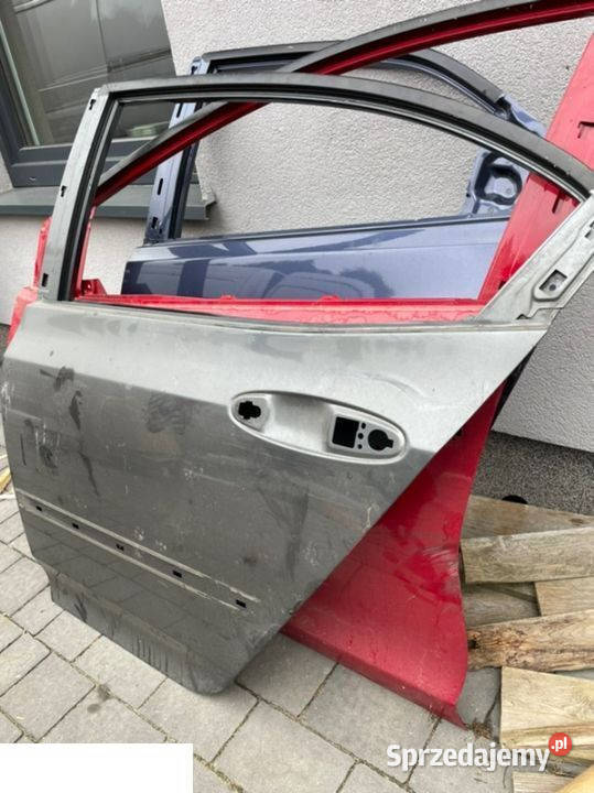 Honda City II drzwi lewy tył 08 Kozubszczyzna