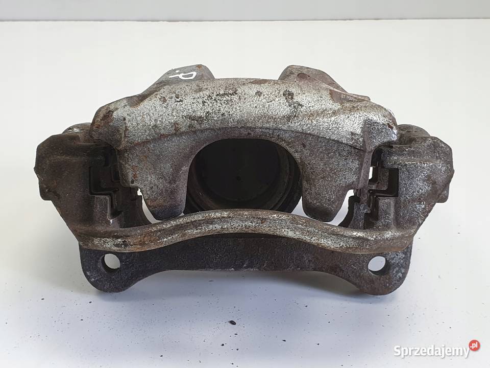 Toyota Corolla XII E21 PRZEDNI ZACISK HAMULCOWY