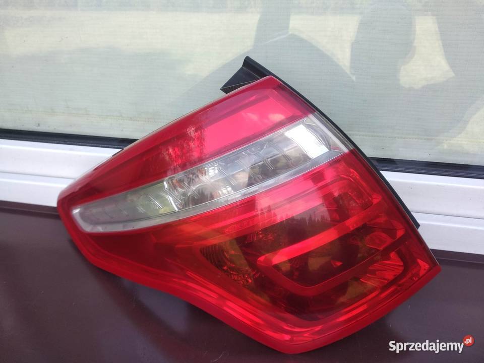Citroen C4 Picasso I 0610 lampa tył tylna lewa w osobowe Sieradz