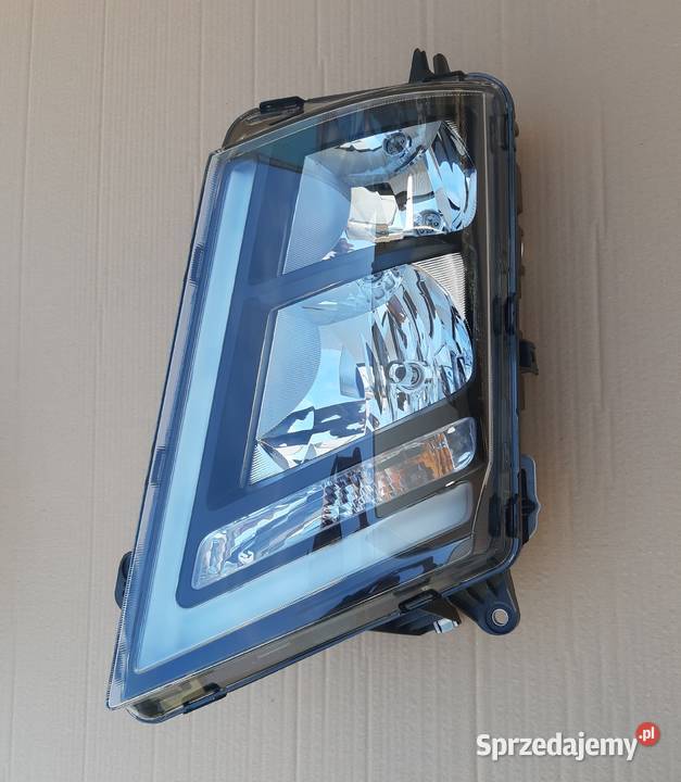 VOLVO FH4 REFLEKTOR LEWY LAMPA LEWA 22239223 Części samochodowe