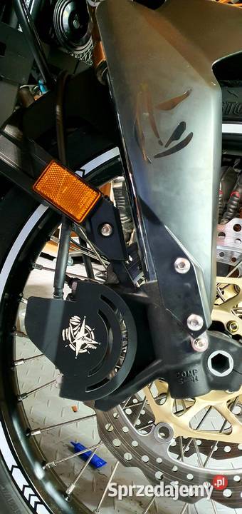 Raising the front wheel fender Mielec
