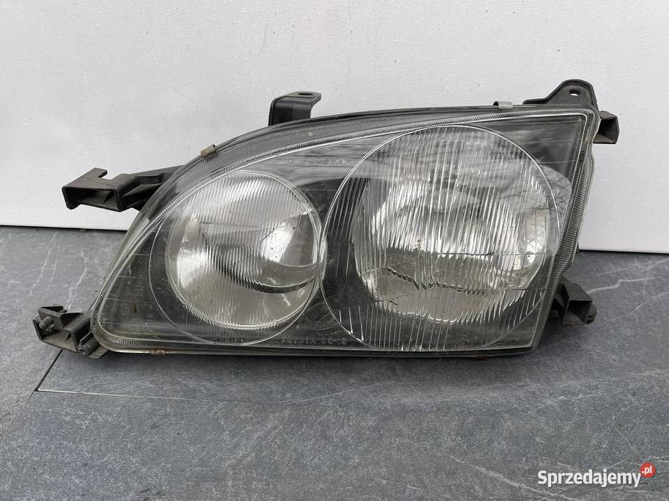 TOYOTA AVENSIS 1 T22 LEWA LAMPA PRZÓD Ostroróg