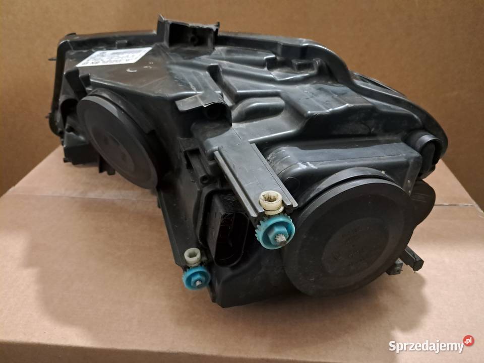 Lampa ksenon skrętny Audi A3 8P0941030 BM Siennica