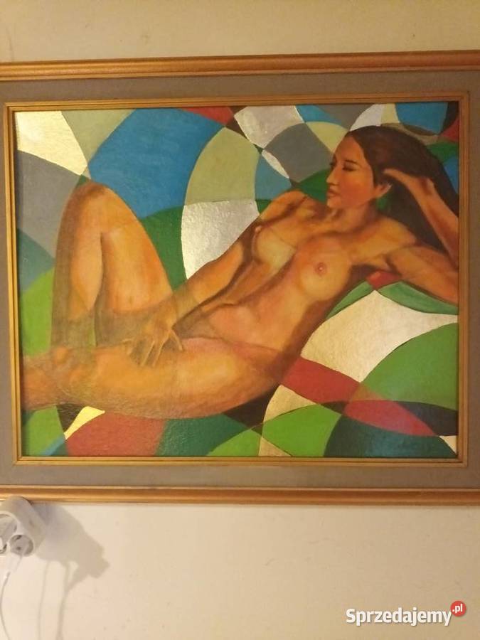 Akt kobiety w kolorstycznym otoczeniu złociste sprzedam