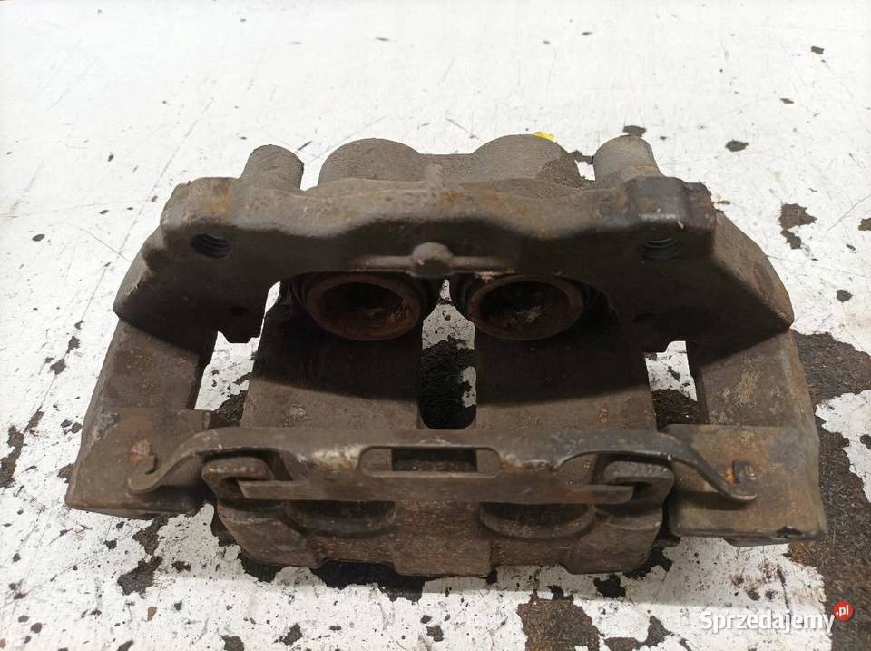 ZACISK HAMULCOWY PRAWY PRZÓD 32 B Volvo XC 90 I