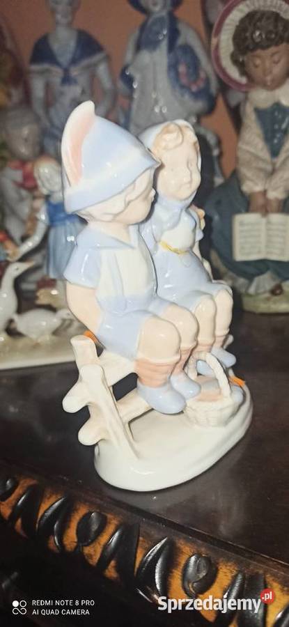 Figurka Dzieci na płocie z koszyczkiem SygTerra Gdańsk sprzedam