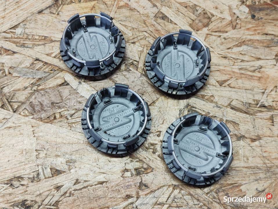 Dekielek Dekielki 54 mm Opel Czarne 13276164 osobowe Pleszew