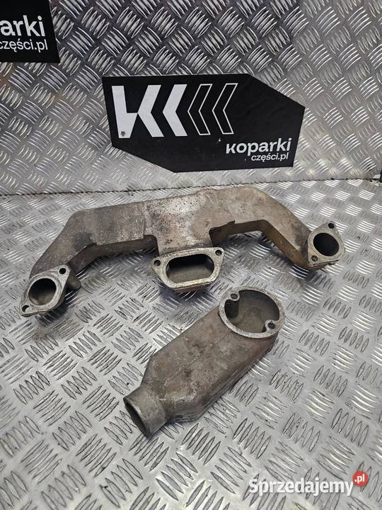 Kolektor ssący do koparkoładowarek Caterpillar