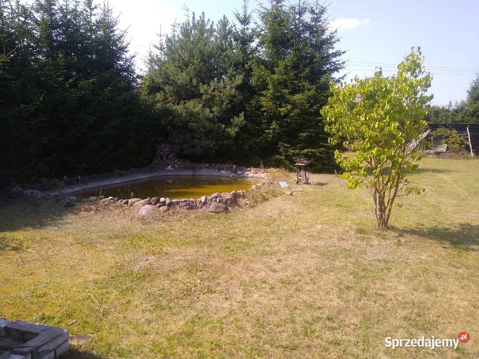 Działka budowlana z budynkami