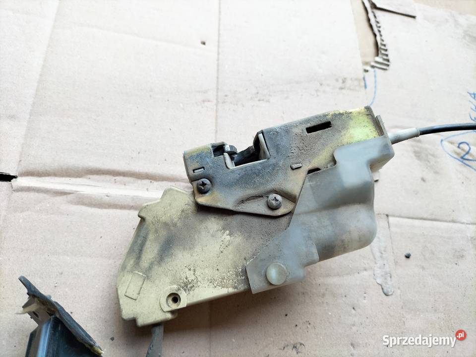 FORD FIESTA MK3 3D KLAMKA ZAMEK DRZWI LEWY PRZÓD osobowe Kamień-Kolonia