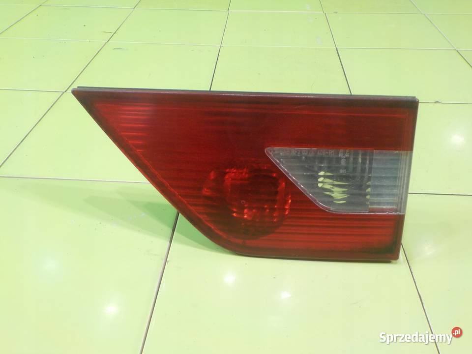 BMW X3 E83 25 B AUT 06r lampa prawa tyl w klape osobowe Suków