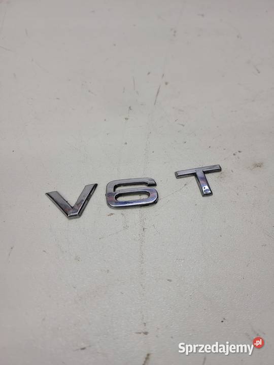 ZNACZEK EMBLEMAT AUDI A6 A7 A8 V6T ORYGINAŁ