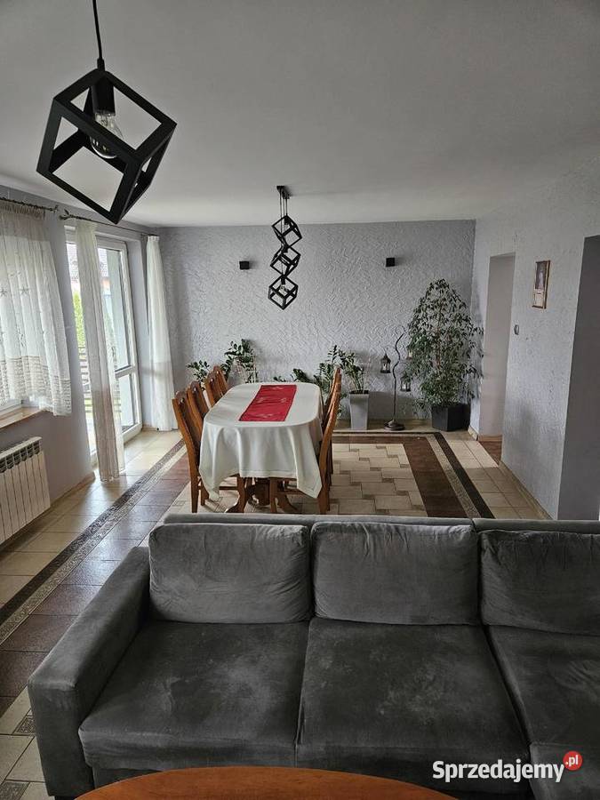 dom na mazurach z pięknym ogrodem i garażem blacha Prusowy Borek