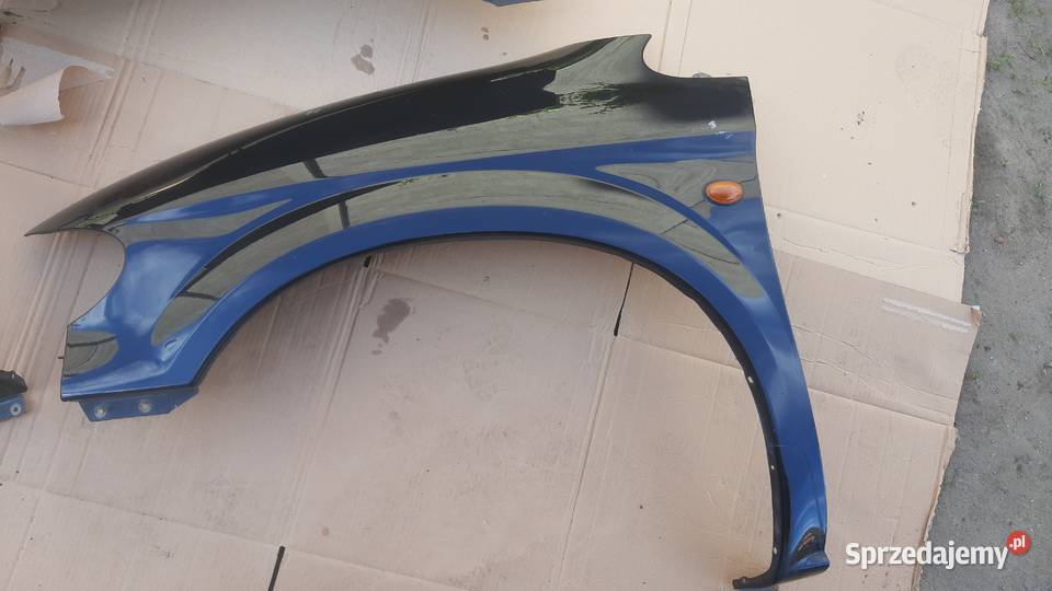 błotnik prawy lewy Chrysler Voyager IV czarny osobowe Dębno