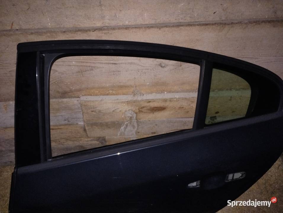 Drzwi Volvo S60 II V60 boczki szyba tył lewy Łomża