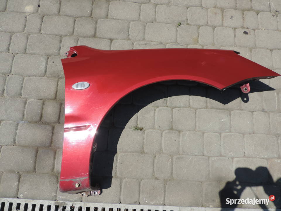 MITSUBISHI LANCER 7 BŁOTNIK PRAWY PRZÓD